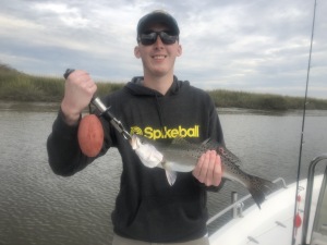 Brandon Hodges with a large sea trout. Nice One!