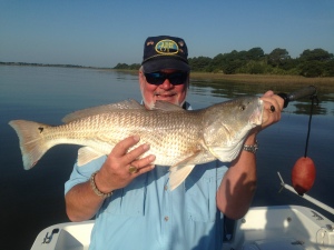 Curtis Hayes with a Birthday Bass! Curtis caught his limit and couple of oversized reds!