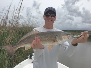 Mark Diehl catching a large red on a gulp bait.