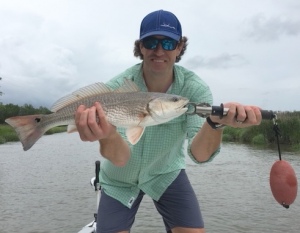 JT Prather catching and releasing a nice red.