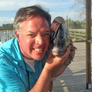 Scott with one his large ones! Nice catch on a foggy day!