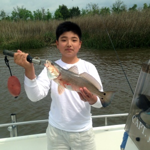 Chris Hirata catching some nice schoolie reds!
