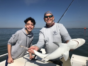 Diego Febus & Capt. Jack with a nice Atlantic Sharpnose Shark.