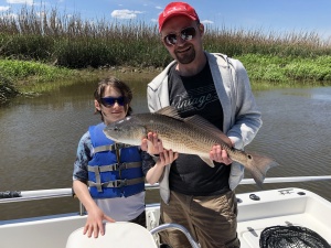 Sasha & his Dad Jonathan with a large red. This was Sasha last fish of the day. Sasha worked some nice ones. Good fish in poor conditions.