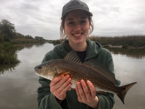 Susannah Rubin catching a schoolie redfish pitching a soft plastic. Nice catch!