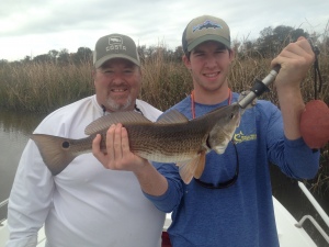 KK fishing with his nephew Bruke. Bruke caught a nice red on 1/8 oz. jig with a live shrimp.