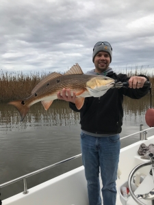 Kyle Luther with a large red. Kyle & Nicole (newly weds) catching a bunch of reds!