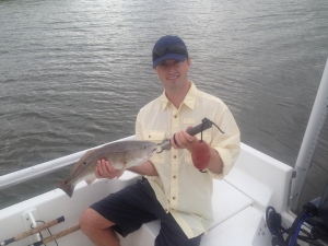 Peter Calder and his sons catching some nice reds!