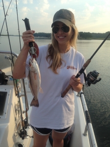 Jordan with a schoolie redfish.