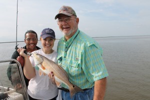 Roland Dann and grand kids catching some seatrout. Roland and grand kids with 25 1/2 inch red.