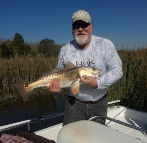 Jillian's dad catch some nice reds!