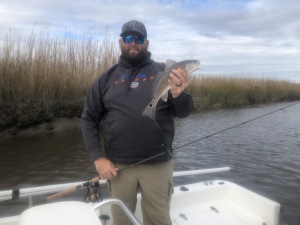 Jason with a nice schoolie redfish.