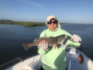 Tom Thompson with a nice red. Fishing was slow but nice day.