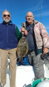 Norm Dionne with a nice flounder. Norm & Roselle had a variety of some sea trout & reds.