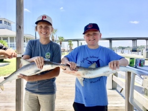 Cade & Mason with a couple of bonnet head sharks. Mason caught his in the last minuet of fishing.