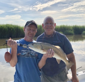 Wes Scroggins celebrating his "50th" birthday with a large red!