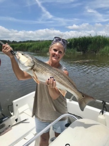 Erin Kennedy with a large red caught a gulp bait.