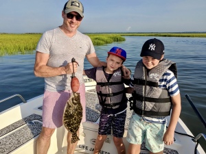 Scott Maxwell & 2 sons catching a variety of fish. Scott younger son Jasper caught a nice flounder. Great start for a first time fisher! Ollie his brother landed several fish as well.