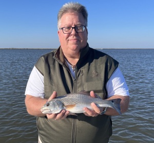 Henry Taylor wit a schoolie red.