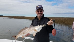 Kevin Kundert with a winter time red. An awesome winter day but reds not eating.