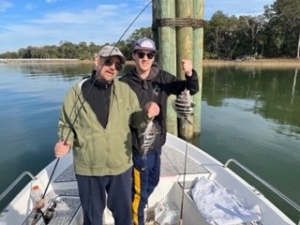 Frank Goshen & son catching & releasing some sheepshead.
