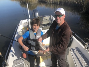 Father David DeFabio & son Raymond catching & releasing some nice reds!
