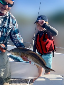 Capt. Jack & John Odum wit a red!