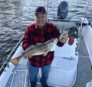 Tommy Hand catching some reds on a windy day!