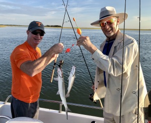 Tyler Morrow & friend Greg catching a variety of fish:  sea trout, redfish & more!
