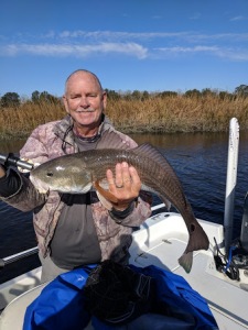 Capt. Jack with a nice red!