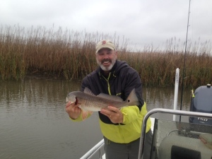 Jim Osborne catching a nice red while pitching jigs.