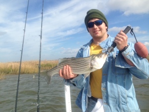 Hunter McKenzie with a Back River striper