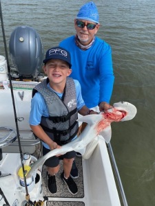 Joshua Burns & Capt. Jack with a bonnet head shark.