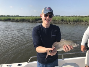Tucker Hemphill with a nice schoolie redfish.