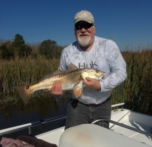 Jillian's dad catch some nice reds!
