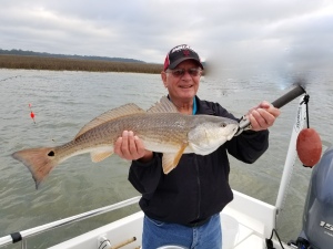 Dave Kenter with a large red on a windy February day.