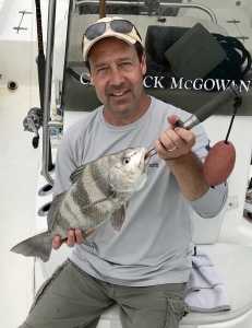 John Kreis catching & releasing a nice black drum.