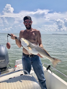 Isacc Pague catching & releasing a large redfish!