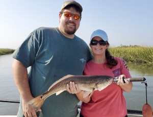 Wade & Camin Wills with a nice reds.  The "honeymoon" couple had a nice catch of reds & sea trout.