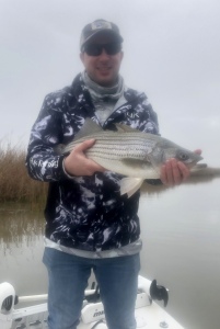 Sid Hoover with a nice striper.