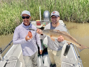 Rob & Justin Tiewell. Justin is holding a nice one.!   The caught several nice ones!