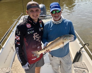 Luke & Billy Watkins.  Billy is holding  a nice red!