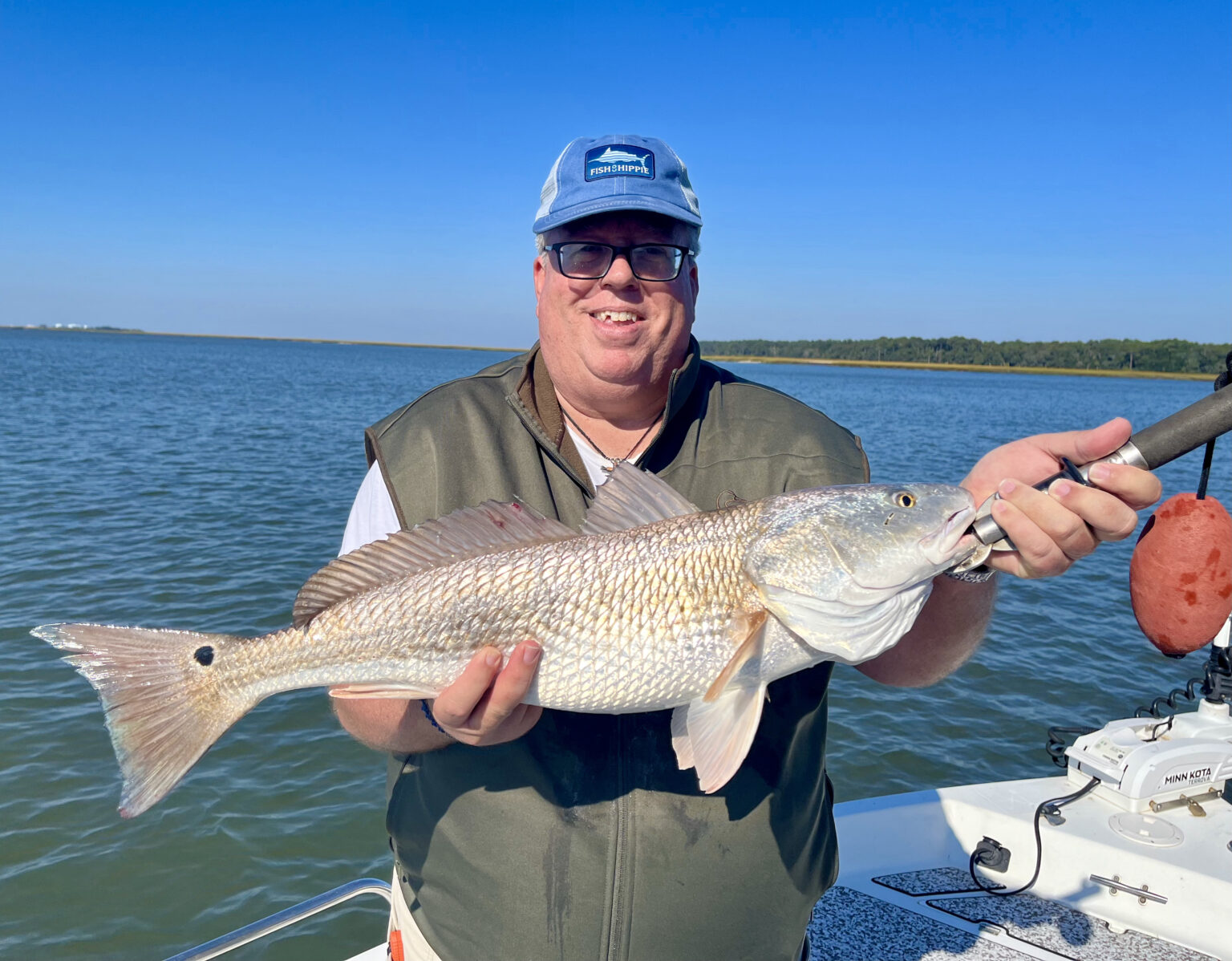 Henry Taylor with a large red! Good fishing on a beautiful day ...